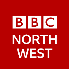 A red box with white text saying BBC North West