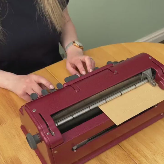 A video of Hayley typing on a Perkins Brailler.