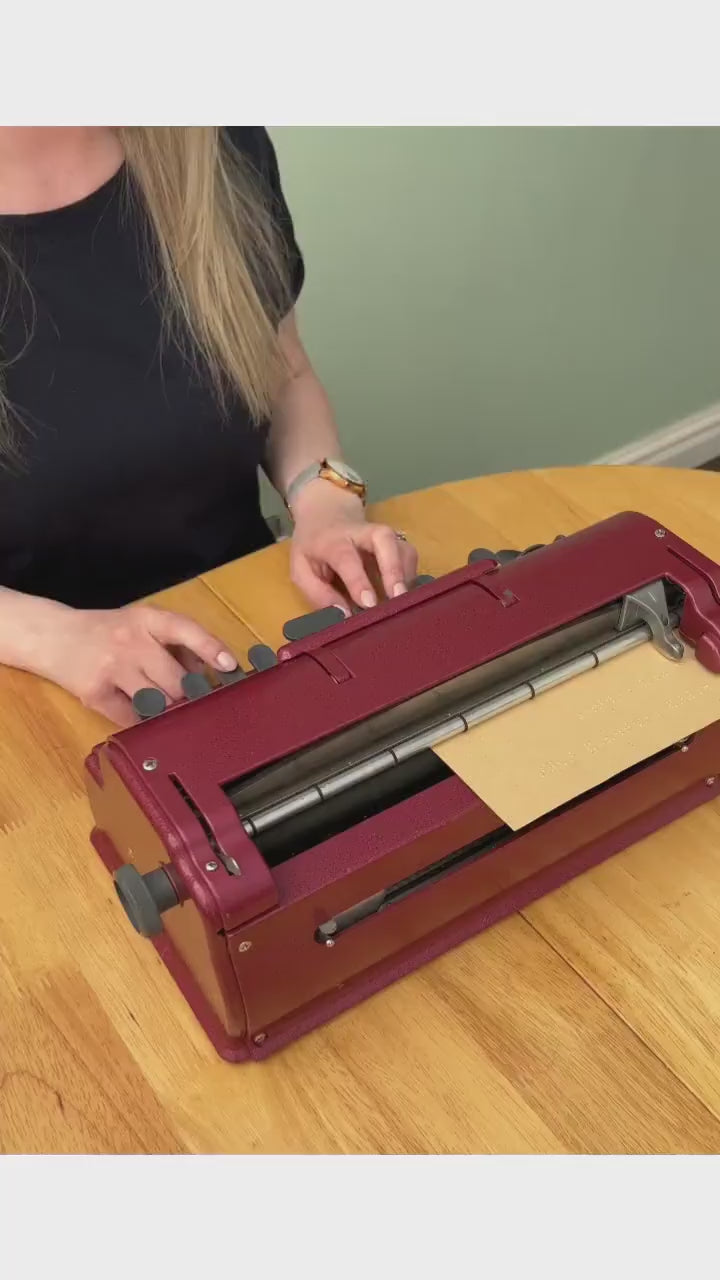 A video of Hayley typing on a Perkins Brailler.